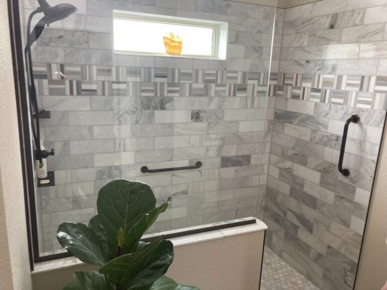 Finished bathroom tile shower by Culligan Construction