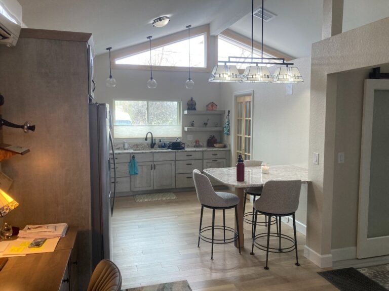 Finished garage conversion kitchen and living space by Culligan Construction